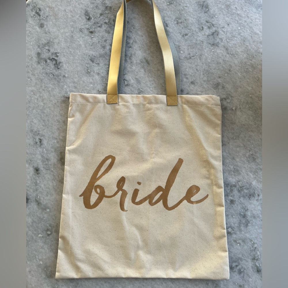 “Bride” canvas tote. Pretty gold lettering and handle. From Nordstrom